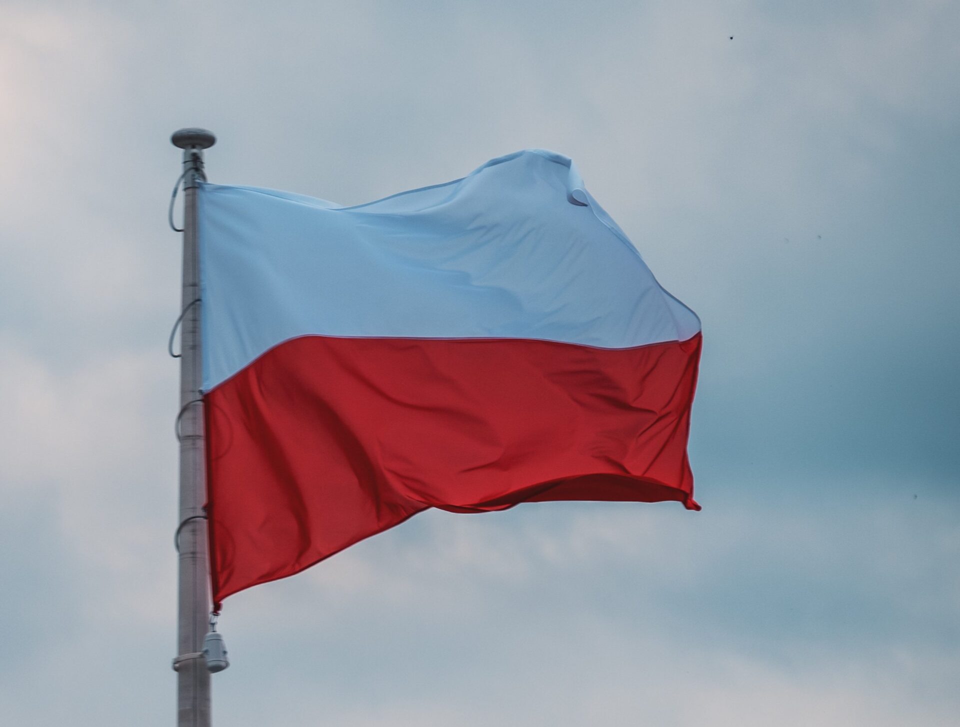 Internationale incasso in Polen 1 Poland Flag nemesia production IJ1gyk5btEM unsplash scaled 2